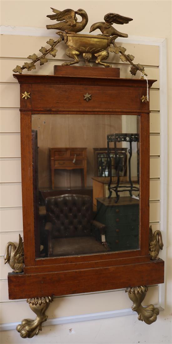 An Italian Empire period fruitwood wall mirror W.69cm